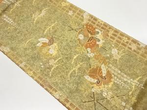 雪輪に花々・蝶模様織出し袋帯